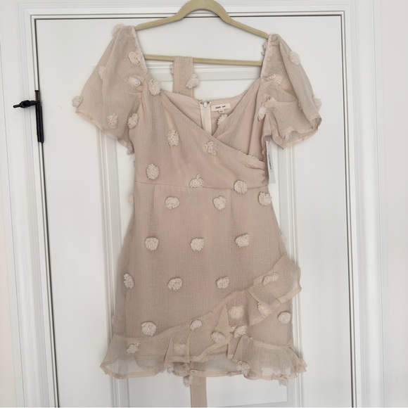 NWT Charming Appeal Beige Pom Pom Puff Sleeve Mini Dress Small - Picture 6 of 11